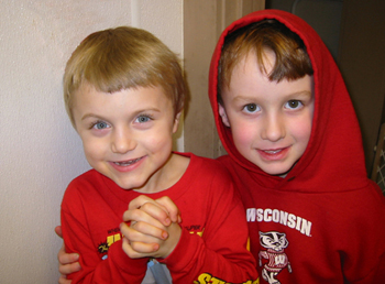 Two happy boys in red.