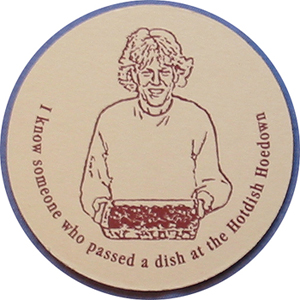 coaster with drawing of woman holding a hotdish