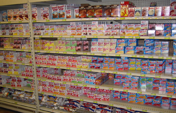 lots o' boxed jell'o on shelf -- and flan